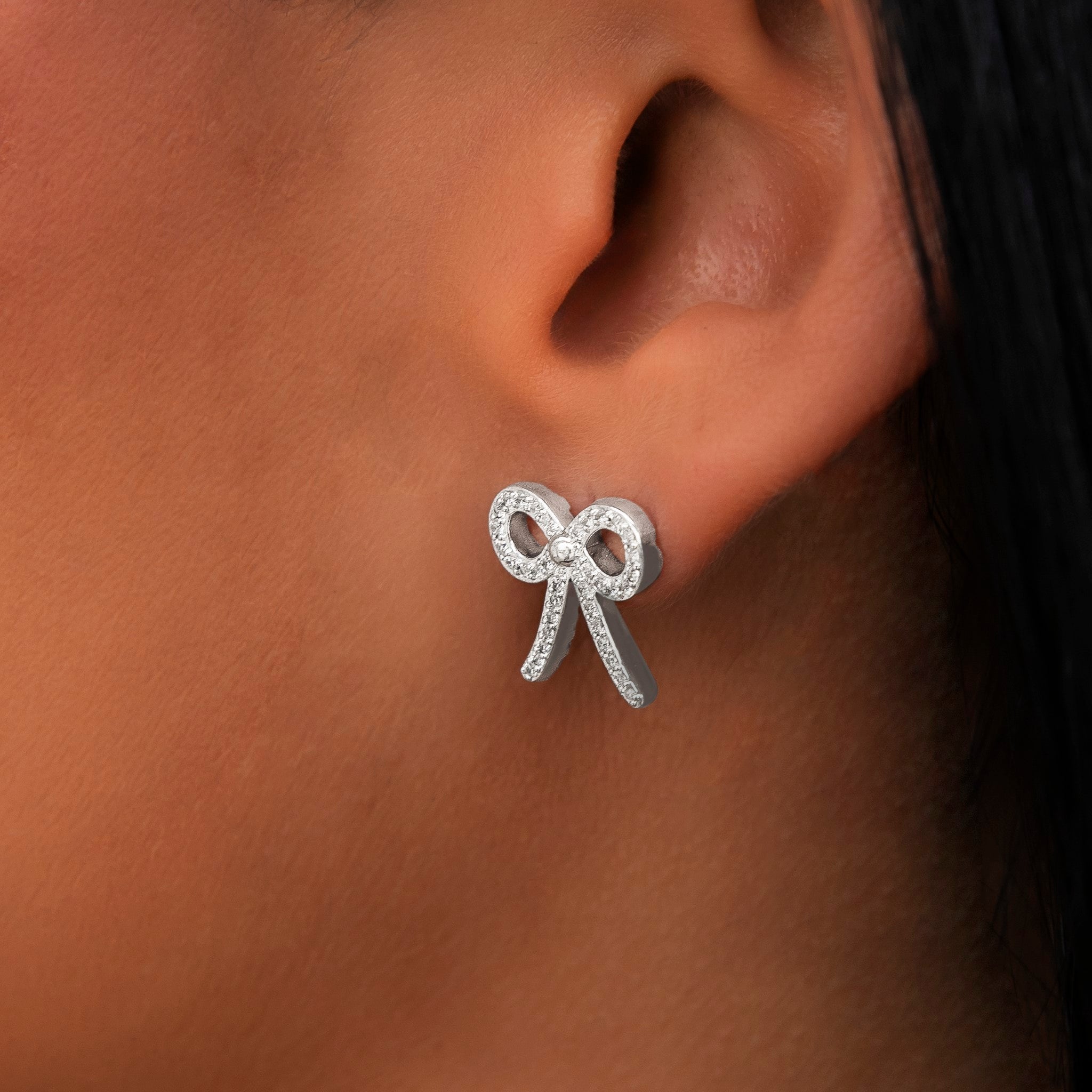 Diamond Bow Stud Earrings in White Gold