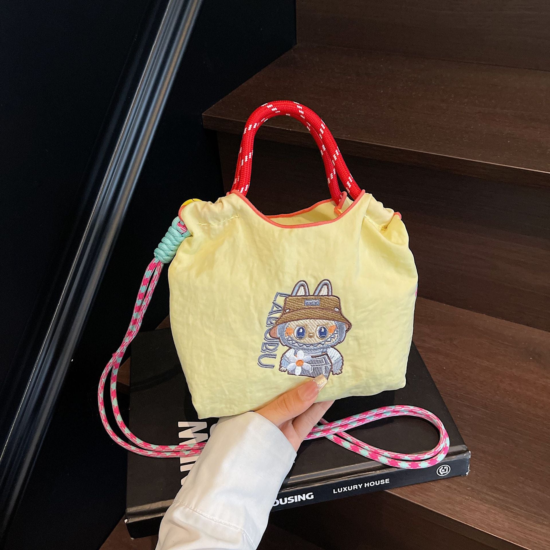 Niche Embroidery Drawstring Messenger Bag