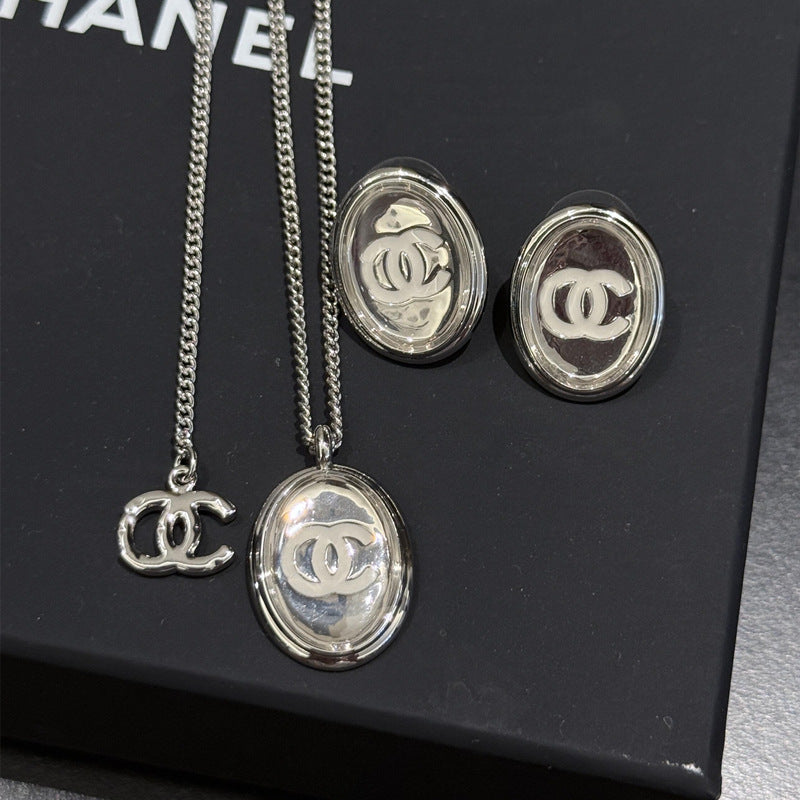 Simple Versatile Oval Mirror Glossy Double C 925 Silver Earrings