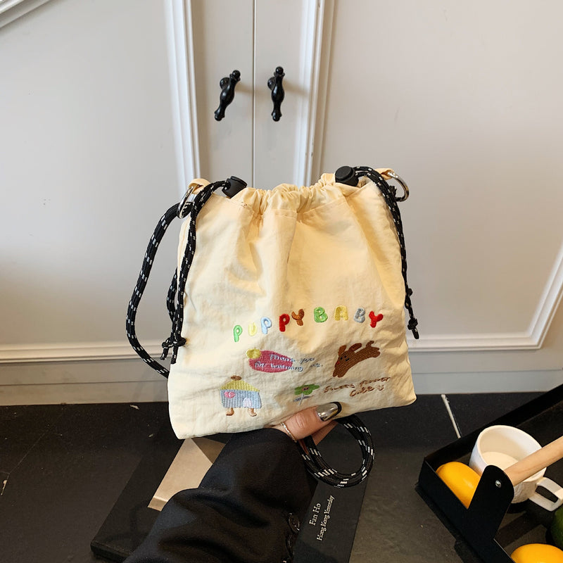 Embroidery Ball Chain Drawstring Shoulder Bag