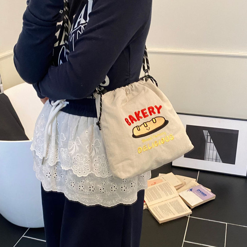 Embroidery Ball Chain Drawstring Shoulder Bag