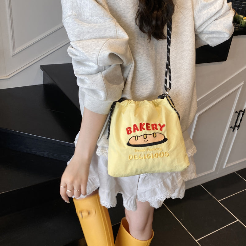 Embroidery Ball Chain Drawstring Shoulder Bag