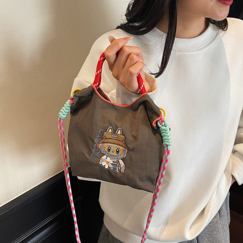 Niche Embroidery Drawstring Messenger Bag