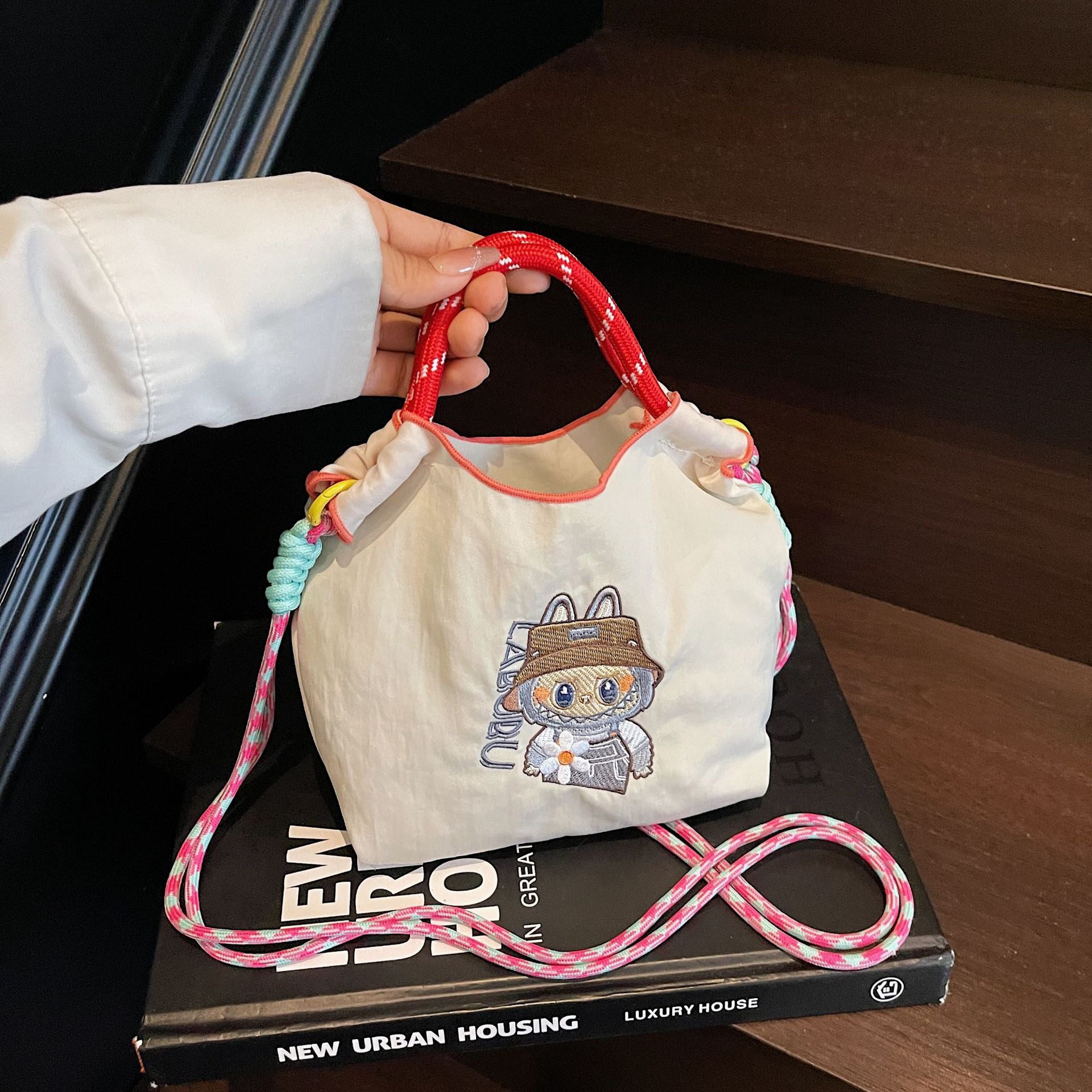 Niche Embroidery Drawstring Messenger Bag